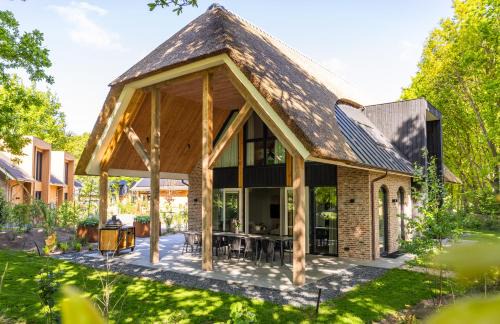 Wekerom House | Boerderij Villa met Binnenzwembad & Wellness - 12 personen - Resort Valley
