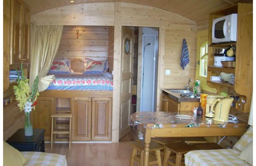 Chomelix House | bohemian stay on the farm, aboard a comfortable and warm trailer