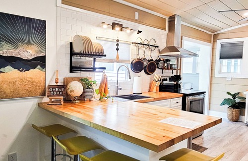 Emerald Isle House | Boho, plant-filled home w/wood + leather touches, 3 beds, 2 baths, super clean.