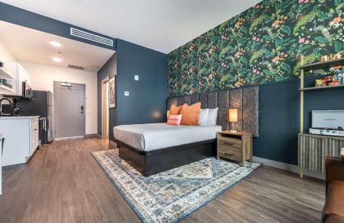 Macon Apartment | Bold and Bright Stay with Cher & Etta James Flair