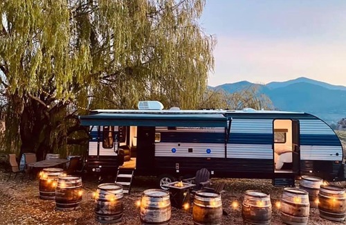 Talent House | BookStayHop - Water's Edge RV at Paschal Winery ~ Hot Tub ~ Mountain Views