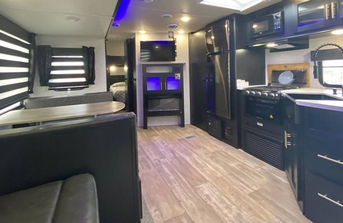 Talent House | BookStayHop - Water's Edge RV at Paschal Winery ~ Hot Tub ~ Mountain Views