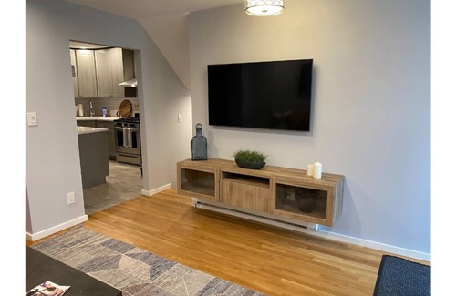 Ditmars Steinway House | Brand New 4-Bedroom Duplex with Parking and Yard-Short term stays available