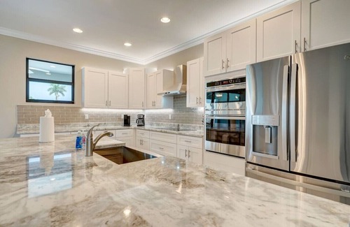 Burnt Store Apartment | Brand New 5 Bedroom Heated Pool Home with 6 Beds