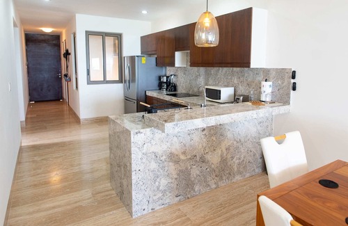 Chicxulub Puerto Condo | Brand New Beachfront Deluxe 3 BR Condo