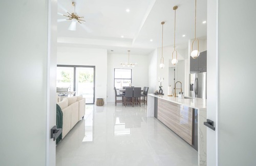 Diplomat House | Brand NEW Cape Coral Luxury Home with Pool, Game Room, Chefs Kitchen, Convenient