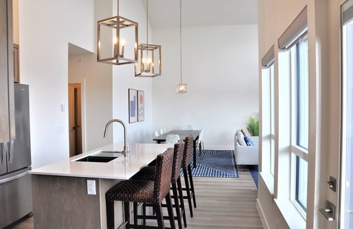 Big White Ski Resort Condo | Brand new Executive, Top Floor Townhome with Private Hot Tub in Happy Valley!