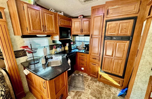 Gatlinburg - Pigeon Forge House | Brand New List! Beautiful RV on Creekfront lot. Amenities galore. Lot 311