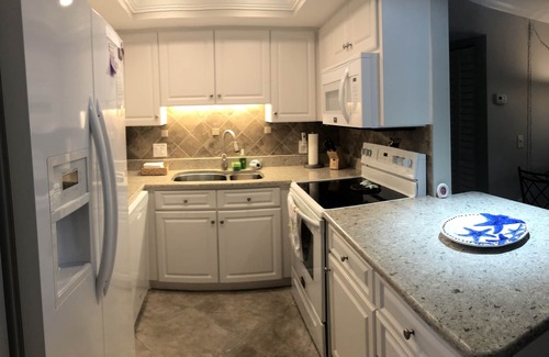 Indian Shores Condo | BRAND NEW POOL AND TENNIS COURTS NEW —-Beach available.