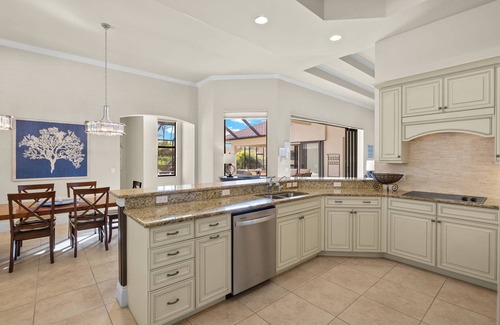 Central Naples House | Briarwood: Home w/two primary suites-saltwater pool/spa & outdoor kitchen & entertaining area w/TV