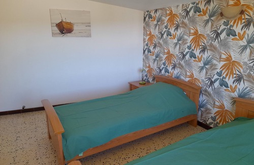 Roujan House | Bright 2-bedroom village house with courtyard.