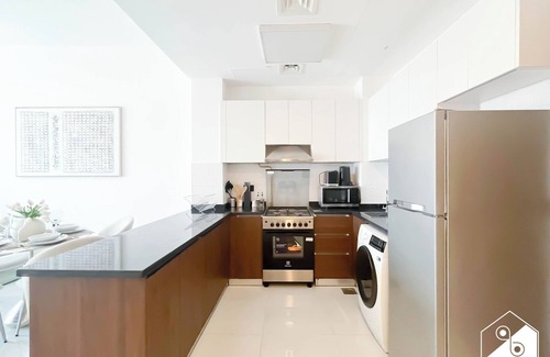 International City Apartment | Bright 2bed Family Home: Pool, Gym & Kids Play