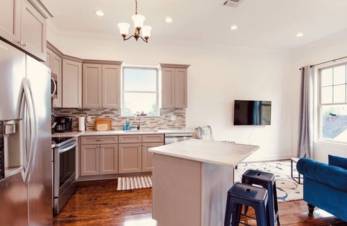 Bywater House | Bright 3BR Upper St. Claude, Bywater Adjacent. WiFI Workspace for Extended Stays