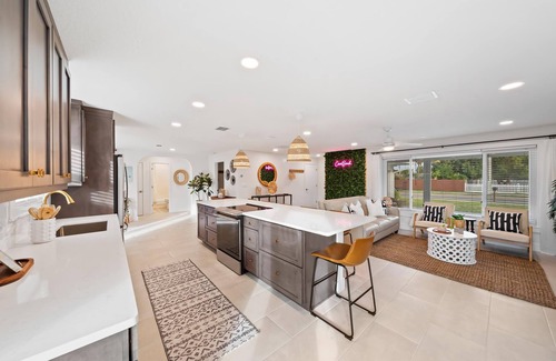 Venetian Way House | Bright and Beachy Pool Home