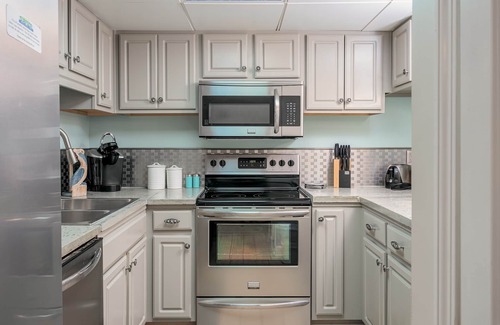 Villa Sabine Condo | Bright and Fun Beach Themed Condo - On Little Sabine Bay - Sand Dollar W107