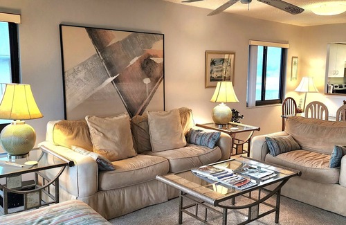 Bradenton Beach Condo | Bright, corner unit, with open floor plan and views from nearly every room!