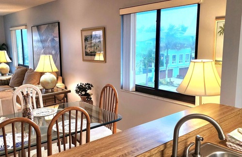 Bradenton Beach Condo | Bright, corner unit, with open floor plan and views from nearly every room!