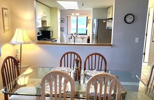 Bradenton Beach Condo | Bright, corner unit, with open floor plan and views from nearly every room!