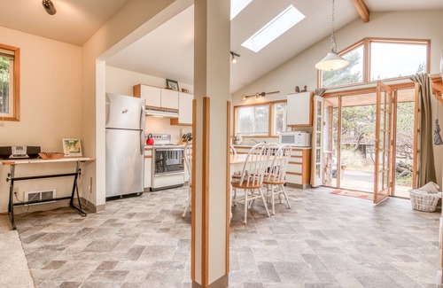 Manzanita House | Bright Cottage Close to Town and Steps to the Beach, Wrap-Around Deck!