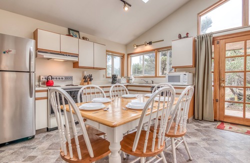 Manzanita House | Bright Cottage Close to Town and Steps to the Beach, Wrap-Around Deck!