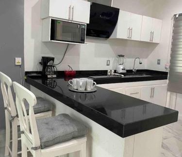 Playacar Fase II Apartment | Bright Luxury Apartment with swimming pool