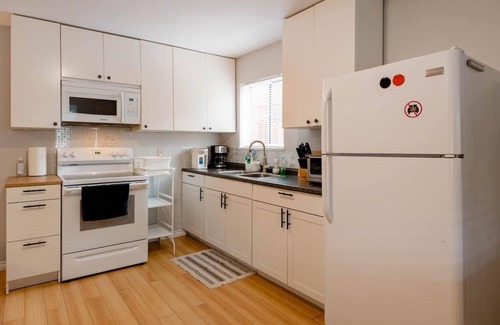 Burnaby House | Bright, spacious two bedroom garden suite near the park