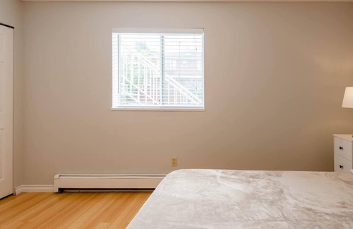 Burnaby House | Bright, spacious two bedroom garden suite near the park