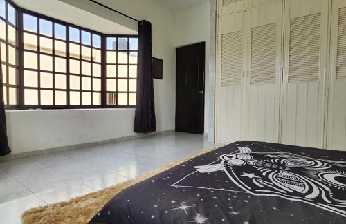 Merida House | Buda Room