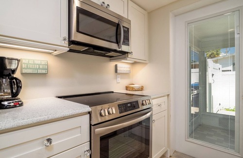 Holmes Beach House | Buddy’s Beach House Private Heated Pool and Spa- Pet Friendly