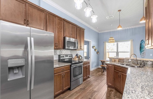 Navarre House | Bungalow; 4/2 spacious home + fire pit/game room