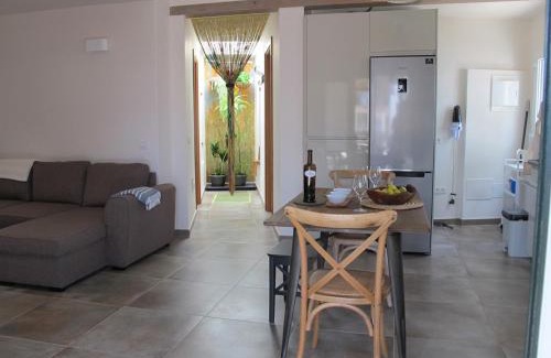 Costa Teguise Apartment | Bungalow GOA Pool view, Playa Roca residence sea front access - Free AC - Wifi