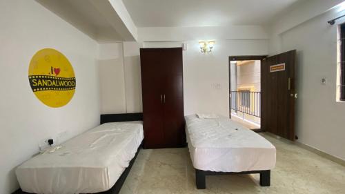 Electronics City Hotel | C SUITES - Royal Homes II Short & Long Stays