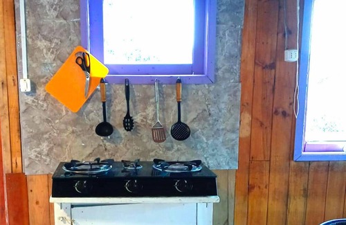 Bahia Mansa Cabin | Cabaña Maicolpue Rio Sur has a large terrace with beautiful ocean view.