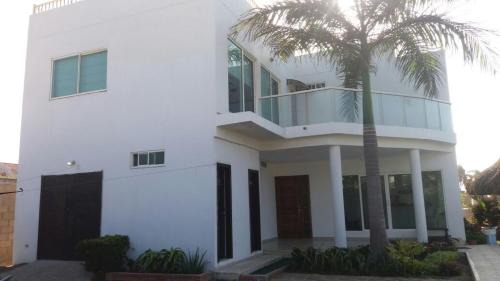 Juan de Acosta House | Cabaña Villa Flower Gold