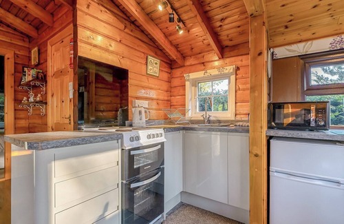 Bronaber House | Cabin 280 is a gold graded cabin located towards the bottom of the holiday village and has a large p