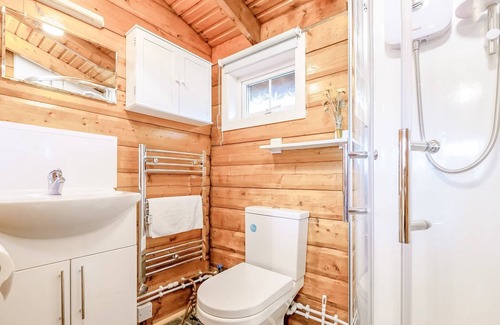 Bronaber House | Cabin 280 is a gold graded cabin located towards the bottom of the holiday village and has a large p