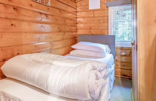 Bronaber House | Cabin 280 is a gold graded cabin located towards the bottom of the holiday village and has a large p
