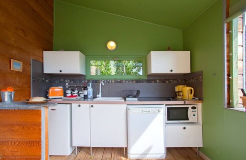 Olmeta di Capocorso Cabin | Cabin in the maquis, terrace and open kitchen with sea and mountain views