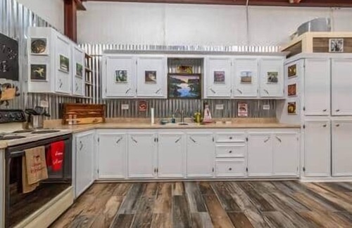 Butte La Rose House | Cajun rustic industrial studio style