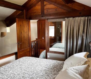 Llo Ski Chalet | Cal Gano, 3-Story Stone & Wood Mountain Retreat