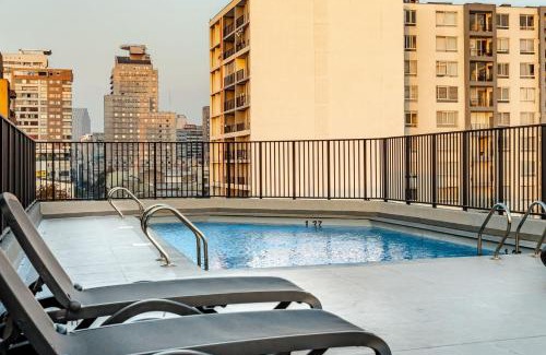 Downtown Santiago Apartment | Cama Premium - Piscina - Terraza y Parrilla - GYM - Wi-Fi - Security 24hr - COMPAÑIA