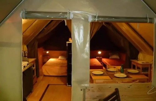 Marcillac-Saint-Quentin House | Camping Le Pont de Mazerat **** - La Cabane Toilée: Camping in half tent, half cabin accommodation! 5 people