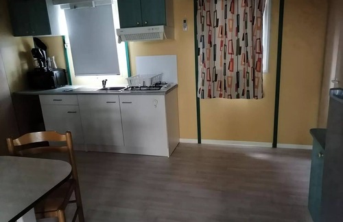 Anduze Ski Chalet | Campsite Flower Les Fauvettes * - Chalet EPICEA comfort 48m2, (3 bedrooms-6 people) with covered terrace, air conditioning and wifi for short stay 6 people