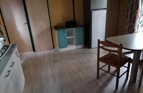 Anduze Ski Chalet | Campsite Flower Les Fauvettes * - Chalet EPICEA comfort 48m2, (3 bedrooms-6 people) with covered terrace, air conditioning and wifi for short stay 6 people