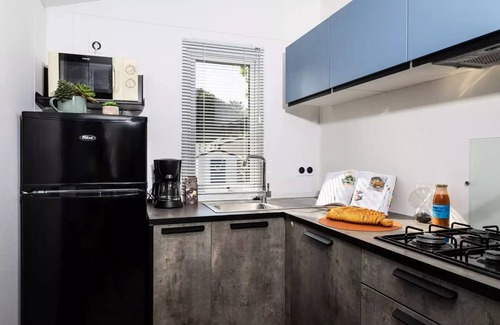 Saint-Jean-de-Monts House | Campsite La Prairie * * - Mobilhome Grand Confort 27m2/2 bedrooms - covered terrace 5 to 6 people - 5 pers. included in the tariff