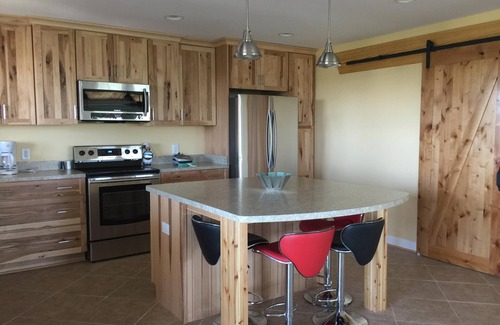 Carova Beach House | Canal front. 4WD area. Hot tub. Screened-in porch. Large deck. Game room.