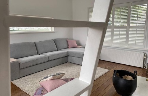 Berkhout House | Canal Side Cozy Home w/ Wood Burning Fireplace