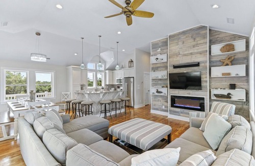 Carova Beach House | Canalfront 6BR home w/pool & hot tub on the beautiful 4x4 beaches of Carova!