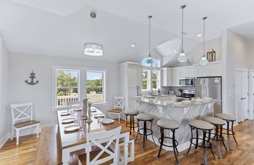 Carova Beach House | Canalfront 6BR home w/pool & hot tub on the beautiful 4x4 beaches of Carova!