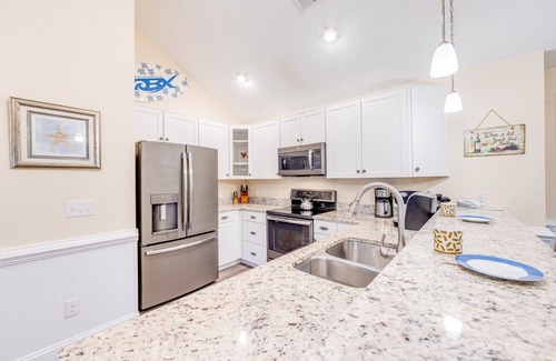 Hatteras Condo | Canalfront Hatteras Condo w/Private Balcony, Resort Pool, Boat Slips, Elevator